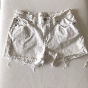 Levi’s cut-off white jean shorts